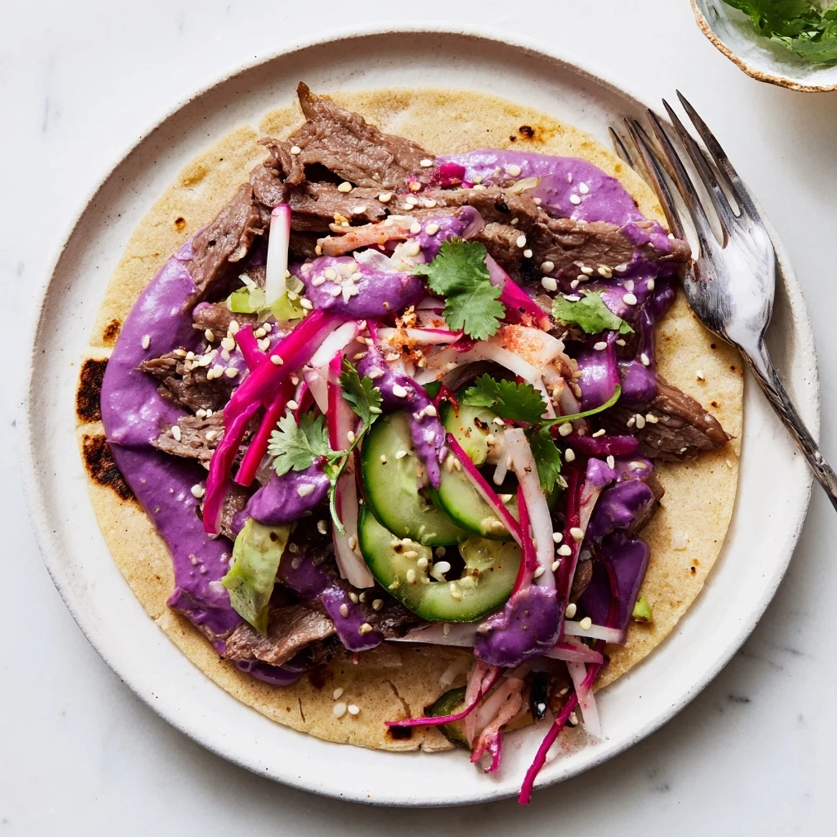 Colorful Global Street-Food Fusion Tacos filled with marinated beef and fresh toppings.  