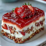 A layered Strawberry Pretzel Jello Salad, sweet, salty, and refreshing dessert.