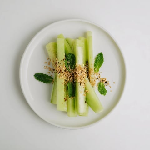 The Bamboo Zen appetizer features crisp cucumber and celery sticks beautifully arranged for serving.
