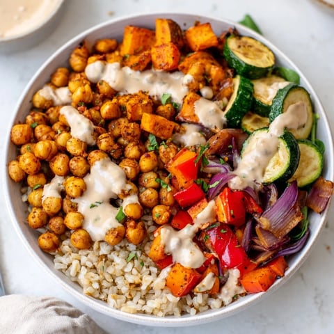 Crispy roasted chickpeas and colorful vegetables star in this vibrant Roasted Chickpea Buddha Bowl.