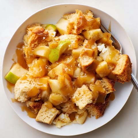 Close-up of a bubbly Caramel Apple Breakfast Bake; gooey, sweet, and comfortingly homemade.