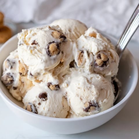 Indulge in cottage cheese ice cream mixed with rich edible cookie dough.  