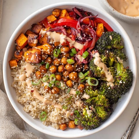 Colorful grain bowls topped with miso-butter and gochujang-maple sauces for flavor.  