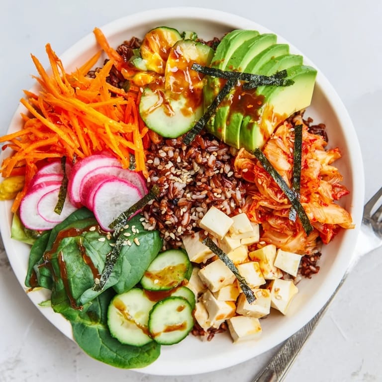 Nourishing and vibrant Fermented Vegetable Bowl with creamy avocado and tangy dressing.