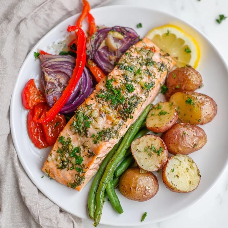 Fresh, herb-infused Lemon Herb Salmon & Potato Sheet Pan, a complete and flavorful meal.