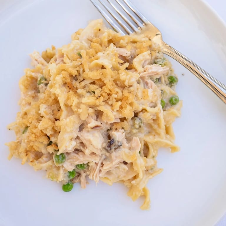 Perfectly baked Creamy Tuna Noodle Casserole, showcasing creamy tuna and noodle filling with a cracker crust.
